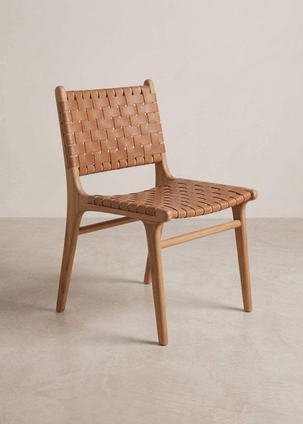 Freja leather cross panel dining chair in natural teak with tan leather