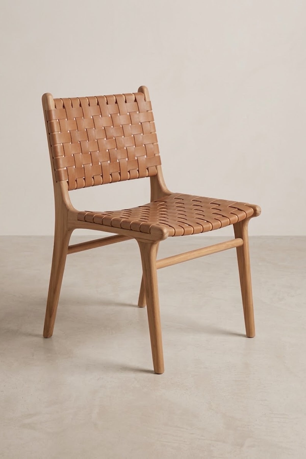Freja leather cross panel dining chair in natural teak with tan leather
