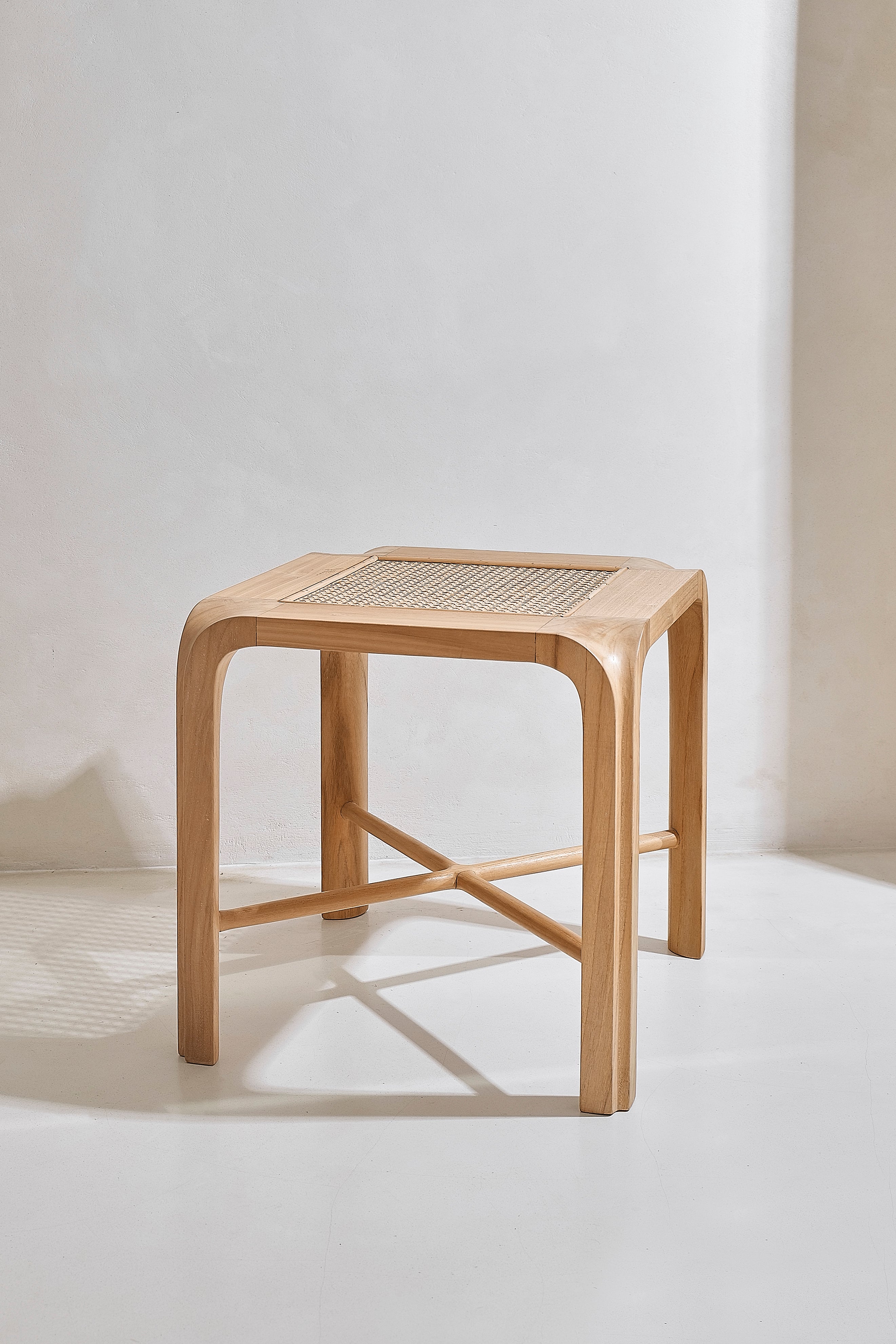 Willow natural rattan and recycled teak side table, cube proportions, front view on white background